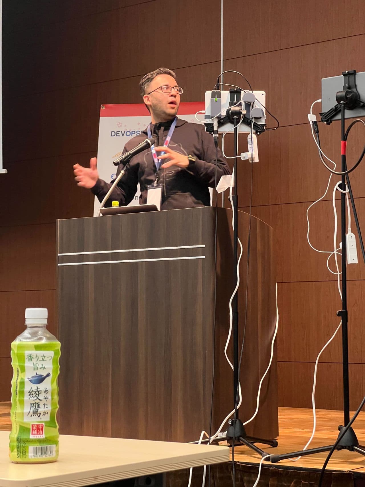Muhammad Shahzeb speaking at DevOpsDays Tokyo 2024